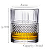 A clear whiskey glass with a heavy base and a textured bowl, measuring 9.2cm high and having a capacity of 32oz.