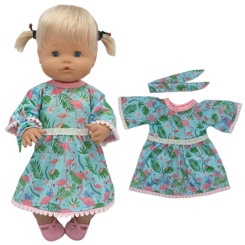 A doll outfit set featuring a light blue floral dress and matching pink trim, displayed next to the doll.