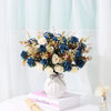 A bouquet of artificial silk roses in shades of blue and cream arranged in a white vase on a light surface.