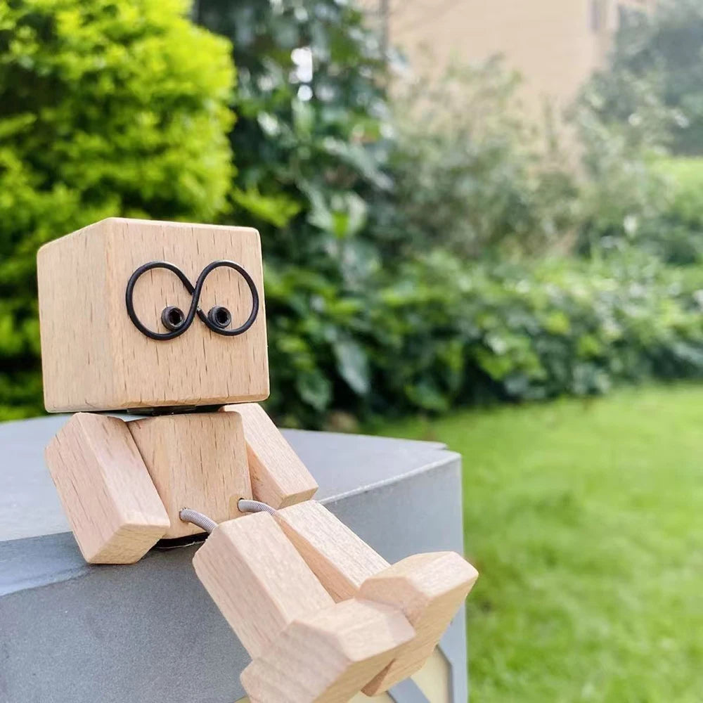 Décoration en bois artisanal à secouer avec un symbole d'infini