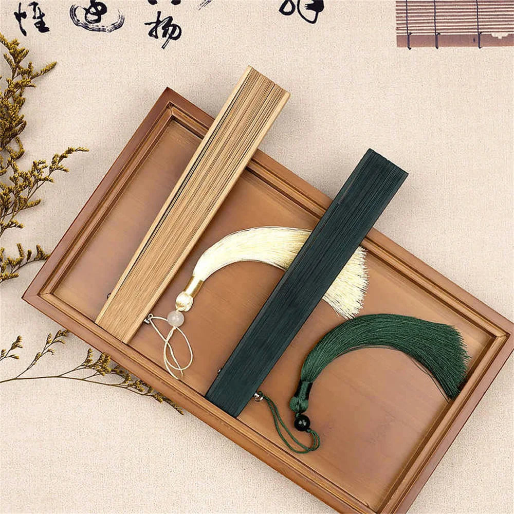 Traditional Bamboo Folding Fan with Solid Color Design