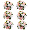 A set of six bouquets featuring pink and white silk artificial roses arranged in a ball centerpiece style.