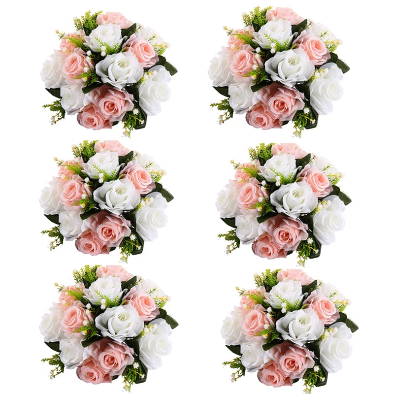 A set of six bouquets featuring pink and white silk artificial roses arranged in a ball centerpiece style.