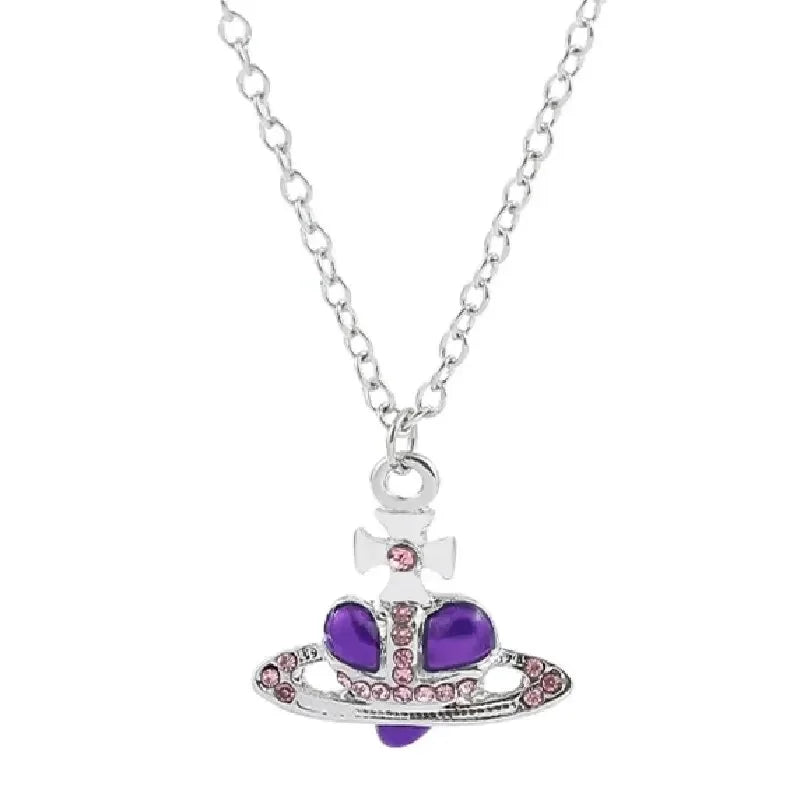Silver pendant necklace featuring a purple diamond-inlaid Saturn design