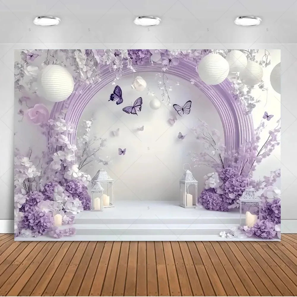 A dreamy purple butterfly photo backdrop featuring white spherical lights and floral arrangements for events.