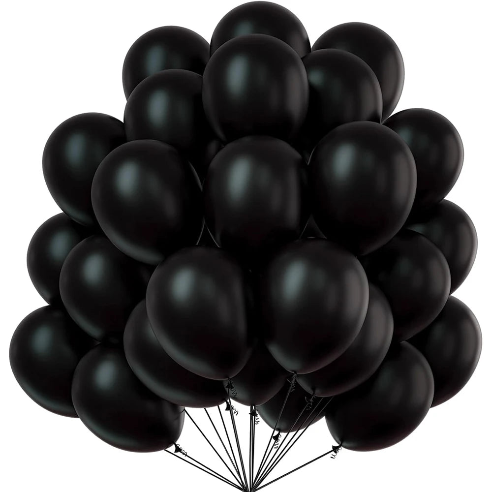 A bunch of black latex balloons clustered together for party decor