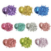 A collection of metallic latex balloons in purple, gold, silver, and blue, displayed next to crinkled metallic foil balloons.