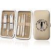 An open leather case containing an 8-piece stainless steel manicure and pedicure kit with various tools.