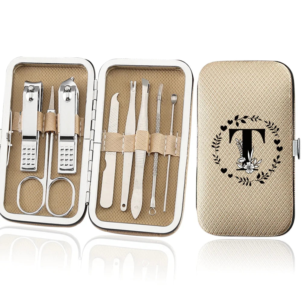 An open leather case containing an 8-piece stainless steel manicure and pedicure kit with various tools.