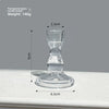 A clear glass pillar candle holder with a wide base and narrow top, shown against a light gray background.