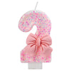 Pink glitter number cake candle with a bow for birthday or anniversary