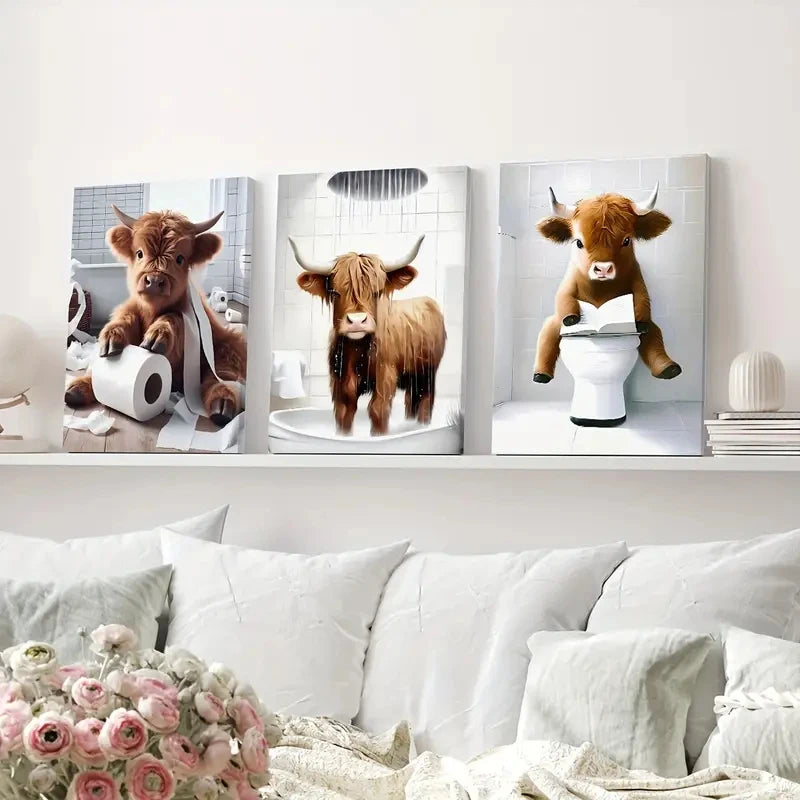 Three framed canvas prints of Highland cows in various poses and contexts