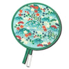 A teal fabric fan with a floral pattern, featuring red and green leaves and small white flowers.
