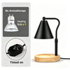 A black adjustable flameless candle warmer lamp with a conical shade and wooden base, shown next to instructions.