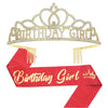 A gold crystal birthday crown and red satin sash with gold lettering for a birthday girl