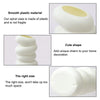 White ceramic spiral vase with a cute shape and appropriate size for home decoration