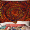 Bohemian mandala tapestry wall hanging featuring intricate, colorful, swirling patterns in reds, oranges, and blues.