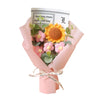 A bouquet of handcrafted crochet sunflowers wrapped in pink paper with a message card.