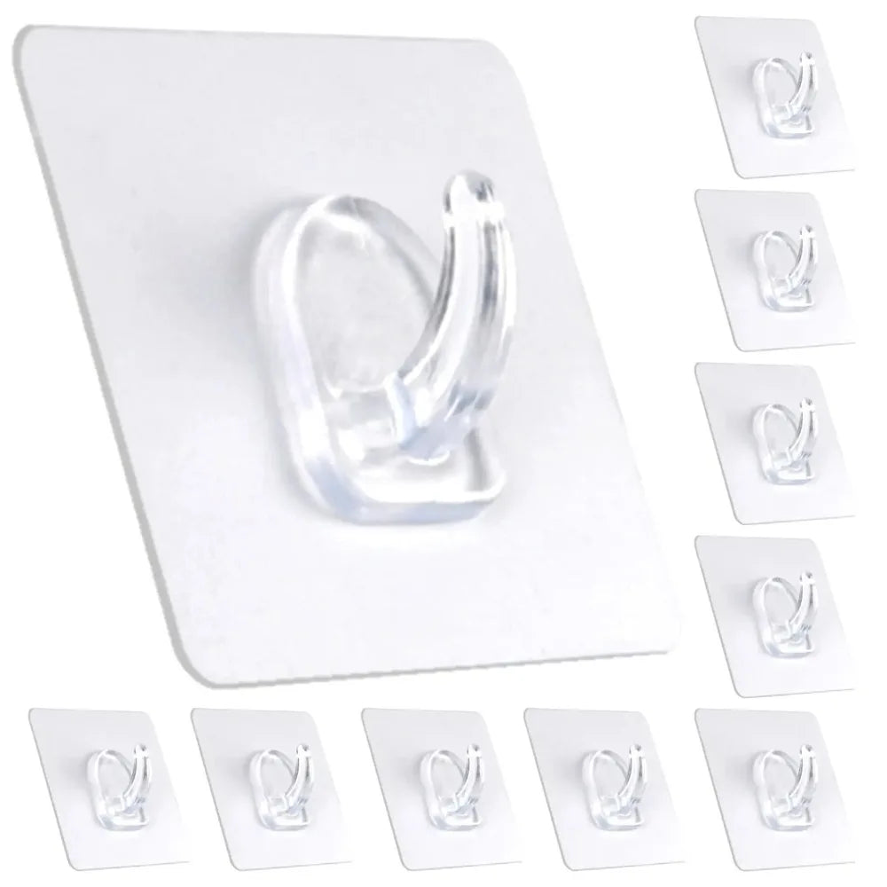 A white adhesive hook dispenser with several transparent self-adhesive hooks.