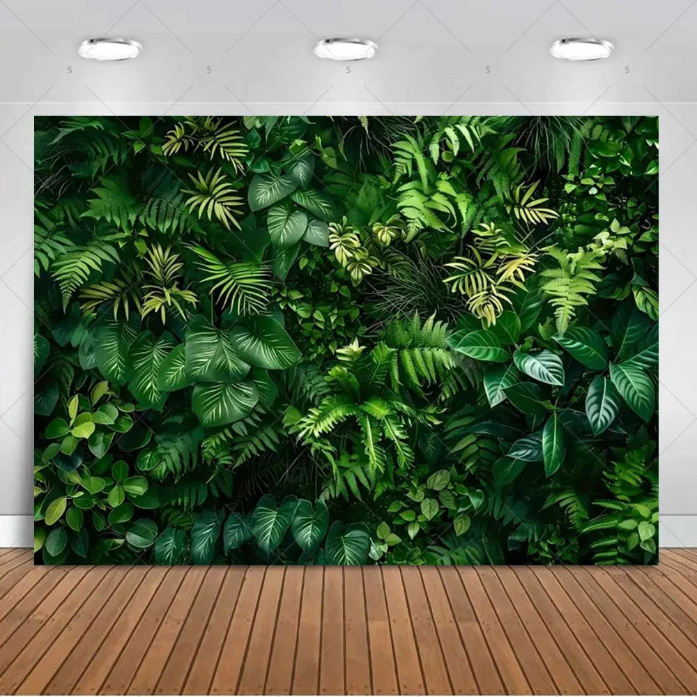 A lush green tropical palm leaf backdrop used for party decor and photography.