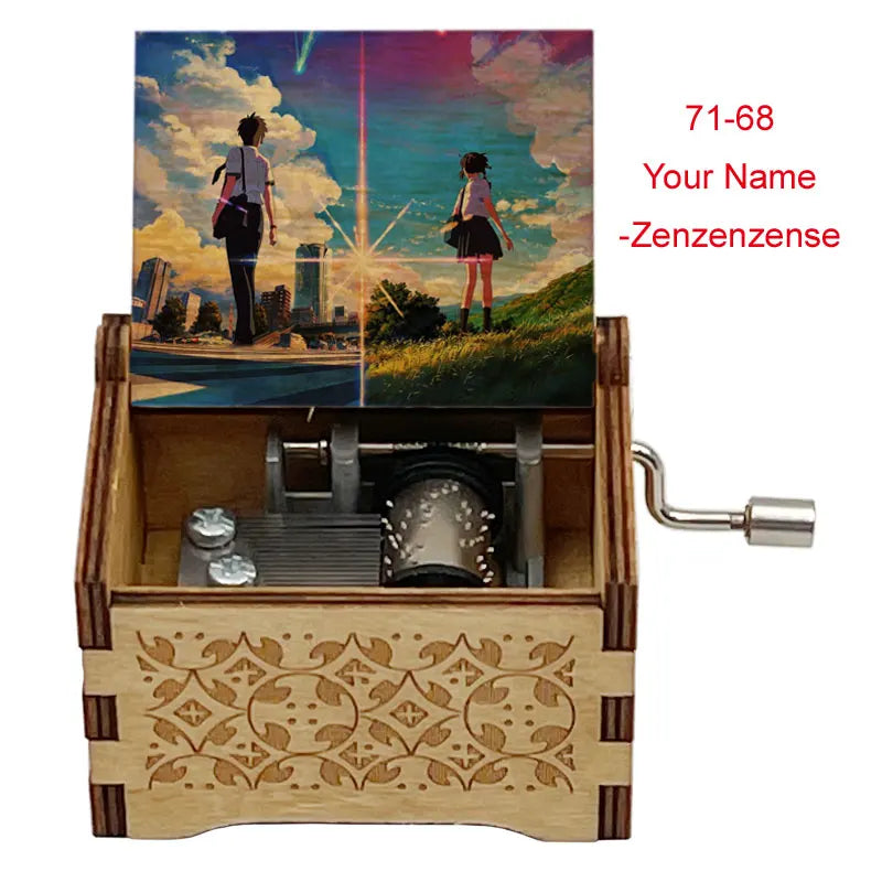 Adorno de caja de música de madera con un diorama de dos figuras contra un cielo colorido.