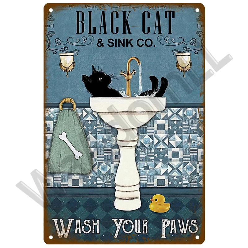 Vintage metal sign featuring a black cat drinking from a sink and the text Wash Your Paws