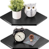 A set of two wall-mounted corner shelves featuring a potted plant and an owl figurine displayed on a dark wooden surface.
