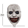 A white demon mask with a wide, menacing grin and dark eyes, used for Halloween cosplay.