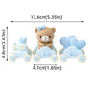 Light blue baby blocks cake toppers featuring a bear and a car design.