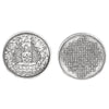 A collection of Tibetan Buddhist statues and ancient coins featuring intricate engravings.