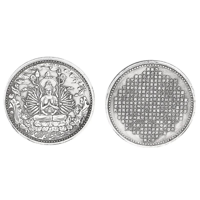 A collection of Tibetan Buddhist statues and ancient coins featuring intricate engravings.