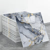 Marble peel-and-stick wall panels featuring gray and black marble with gold veining