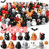 A collection of 24 mini resin Halloween duck figurines in various colors and designs for decoration.