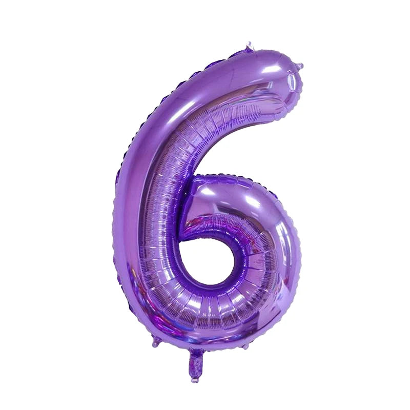 A purple foil number balloon shaped like the number 6.