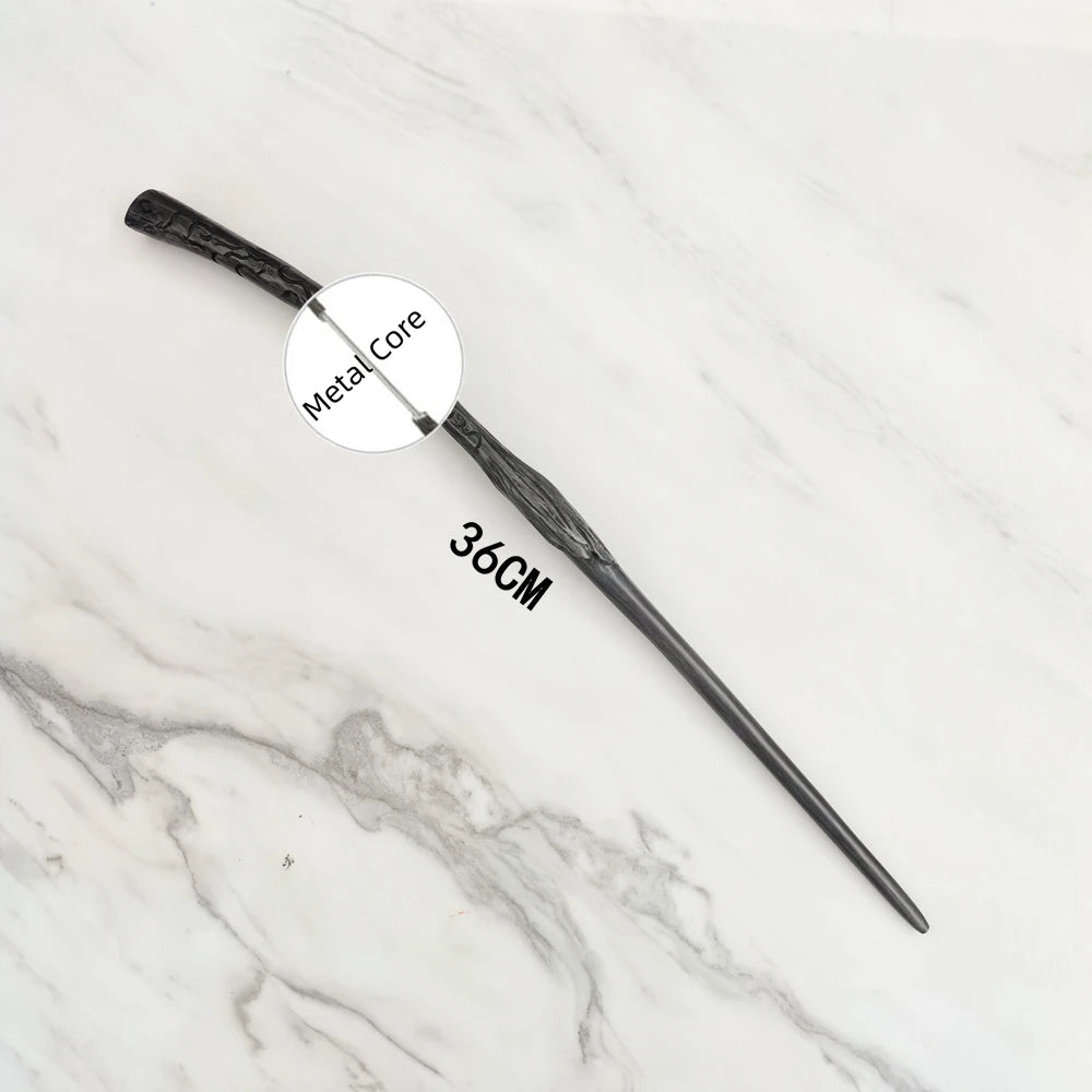 A black metal magic wand replica with a circular label marked Metal Core is displayed on a white marble surface.