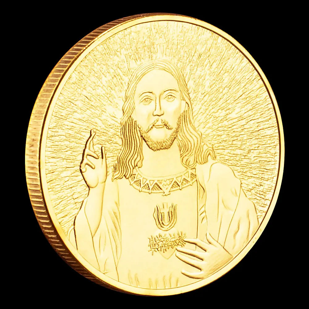 A gold-plated commemorative coin featuring a depiction of Jesus Christ with radiating light.