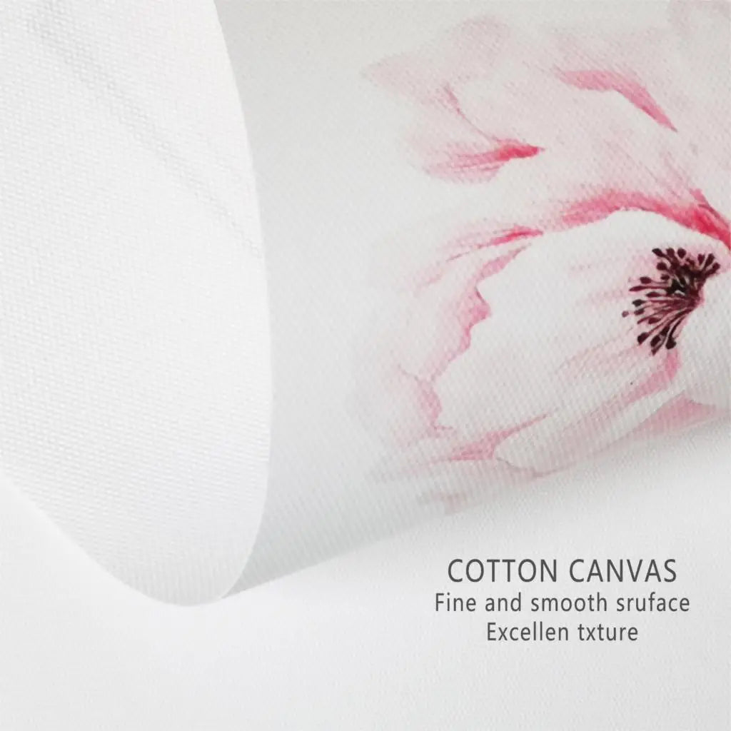 Close-up of a white cotton canvas print featuring soft pink floral and woodland mouse designs.