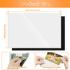 A white magnetic picture frame measuring 15cm by 10cm shown with features like a full magnet back and opening on two sides.
