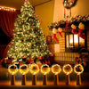 A festive Christmas scene featuring a decorated tree and ten glowing LED wine bottle cork lights.