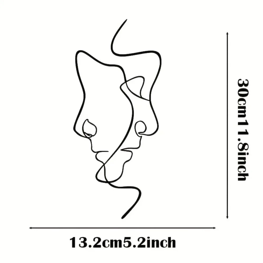 Minimalist abstract face metal wall art showing a stylized, flowing line design.