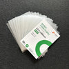 A stack of 50 clear plastic card sleeves with green and white text is shown on a dark gray surface.