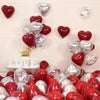 A collection of red and silver heart-shaped latex balloons used for party decoration.