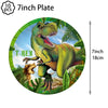 A green T-Rex dinosaur decoration on a circular plate for a birthday party kit.