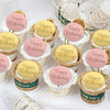 A set of ten happy birthday acrylic cupcake toppers in pink and gold on wooden sticks.