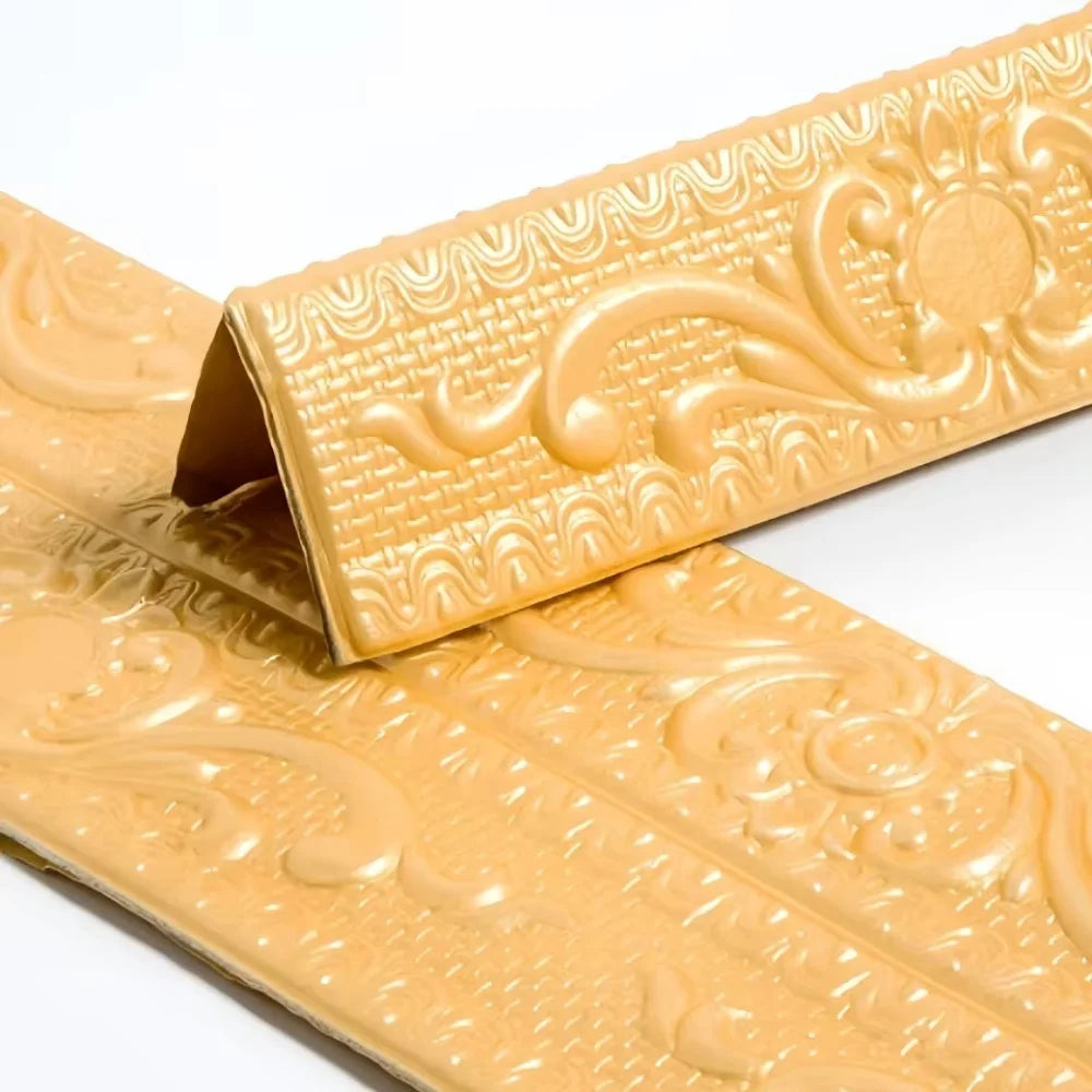 Close-up of a gold self-adhesive PVC corner trim with a 3D textured edge.