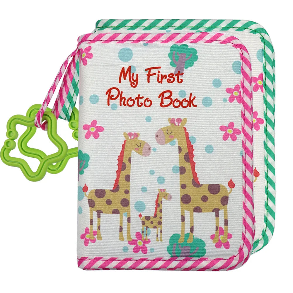 A pink and green striped fabric photo book featuring a giraffe design for a first year baby photo album.