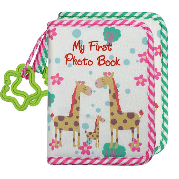 A pink and green striped fabric photo book featuring a giraffe design for a first year baby photo album.