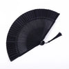 Black traditional Chinese folding fan with a pleated design