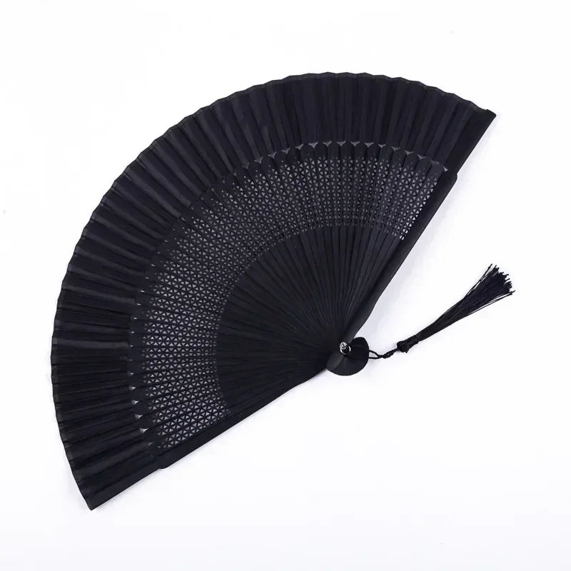Black traditional Chinese folding fan with a pleated design