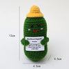 Handmade crochet potato doll with a yellow hat and a green body, featuring an inspirational card.